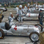 Mercedes Benz and Auto Union “Silver Arrows” line up at the starting grid of the Donnington 1937 British Grand Prix. Image by James Dietz.