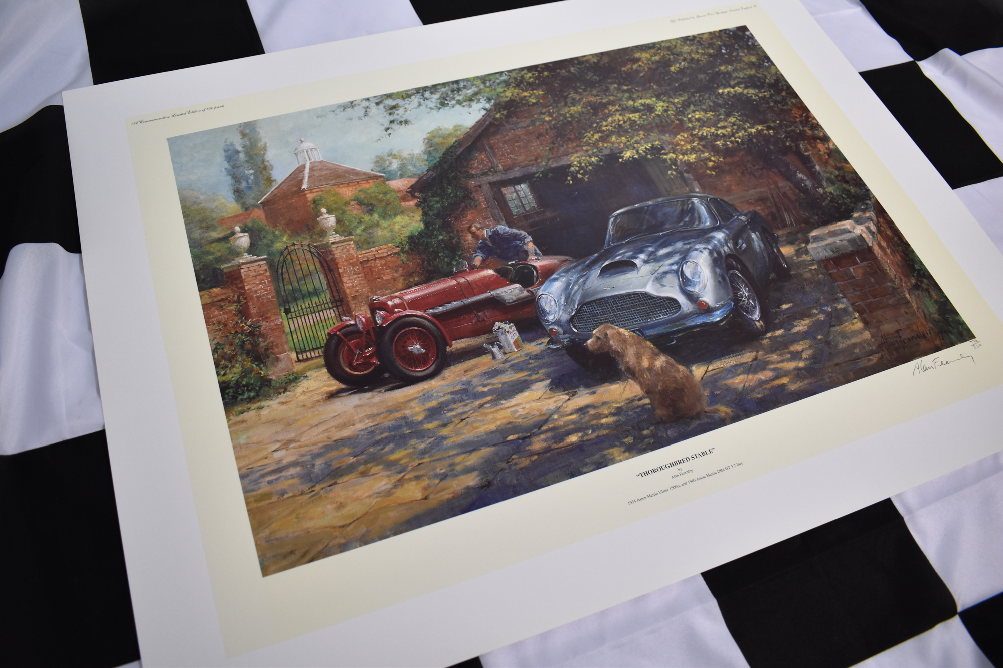 limited edition print of a 1934 Aston Martin Ulster 1500cc and a 1960 Aston Martin DB4 GT 3.7Ltr portrayed in an idyllic country house scene by leading automotive artist Alan Fearnley.